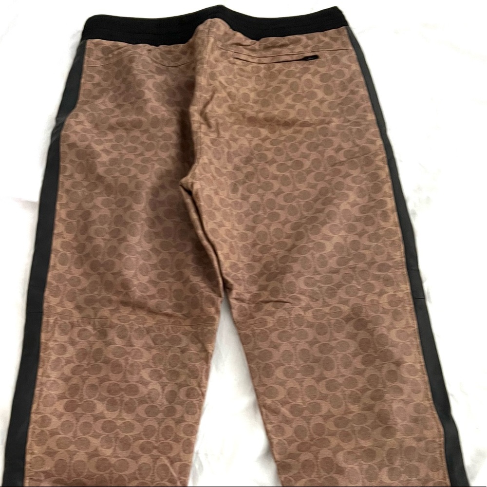 COACH logo printed faux leather sweatpants. Size XL